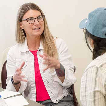 Teresa Risovi meeting with classmate